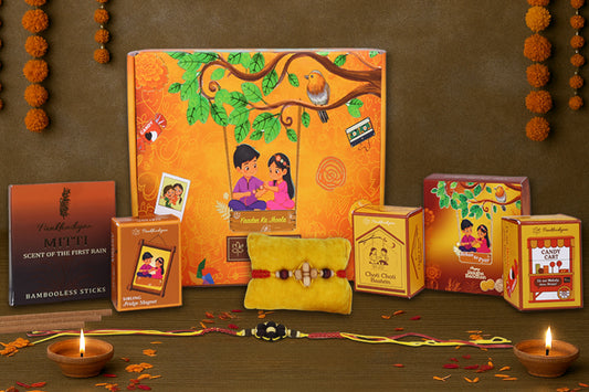 Rakhi Premium Gift Box for Bhaiya and Bhabhi with 10 Inclusions - Fragrant Sandal-Tulsi Beads Rakhi and Bracelet, Mitti Fragrance Bambooless Incense, Ceramic Diffusor, Fridge Magnet, Sibling Conversation Cards, 90s Candy Box, Maze Card, Roli and Chawal